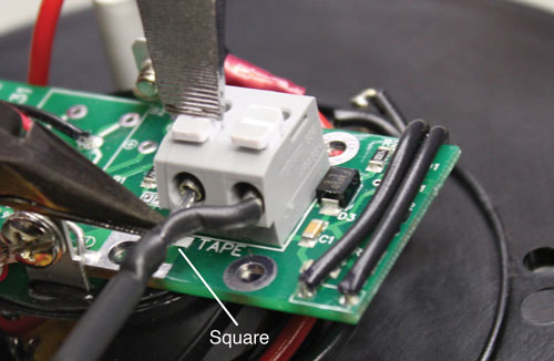 connect the cable to the new circuit board assembly by pressing down on the white terminals on the circuit board and inserting the leads release the terminals and the leads should be secured